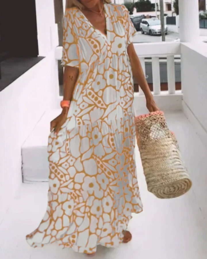 CHRISTINE | Élégante robe d’été longue à la silhouette fluide et au motif graphique tendance