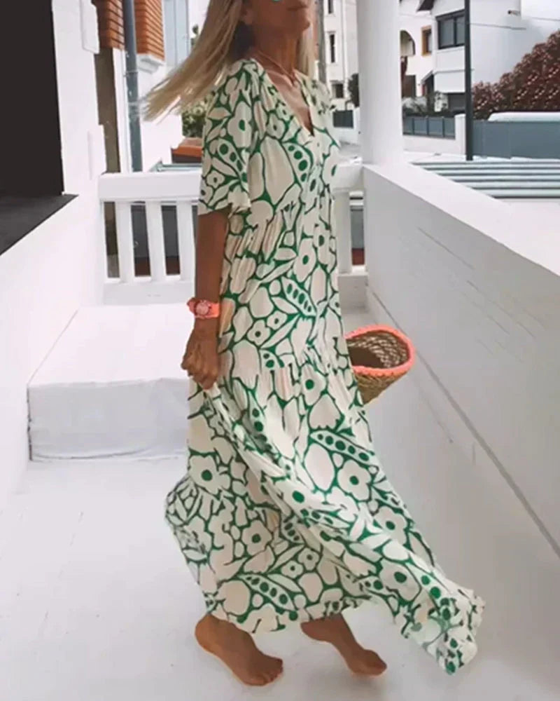 CHRISTINE | Élégante robe d’été longue à la silhouette fluide et au motif graphique tendance