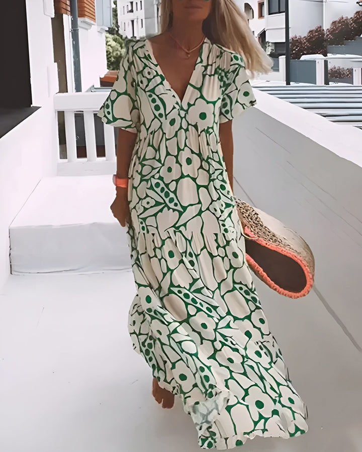 CHRISTINE | Élégante robe d’été longue à la silhouette fluide et au motif graphique tendance