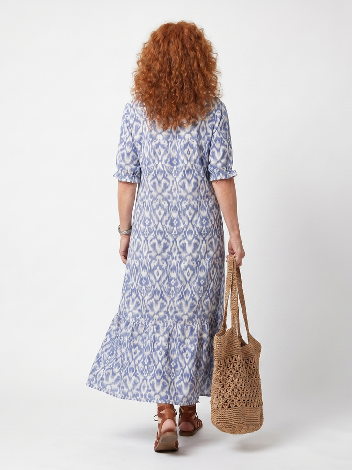 Ottoline | Robe midi imprimée à col noué à pompons