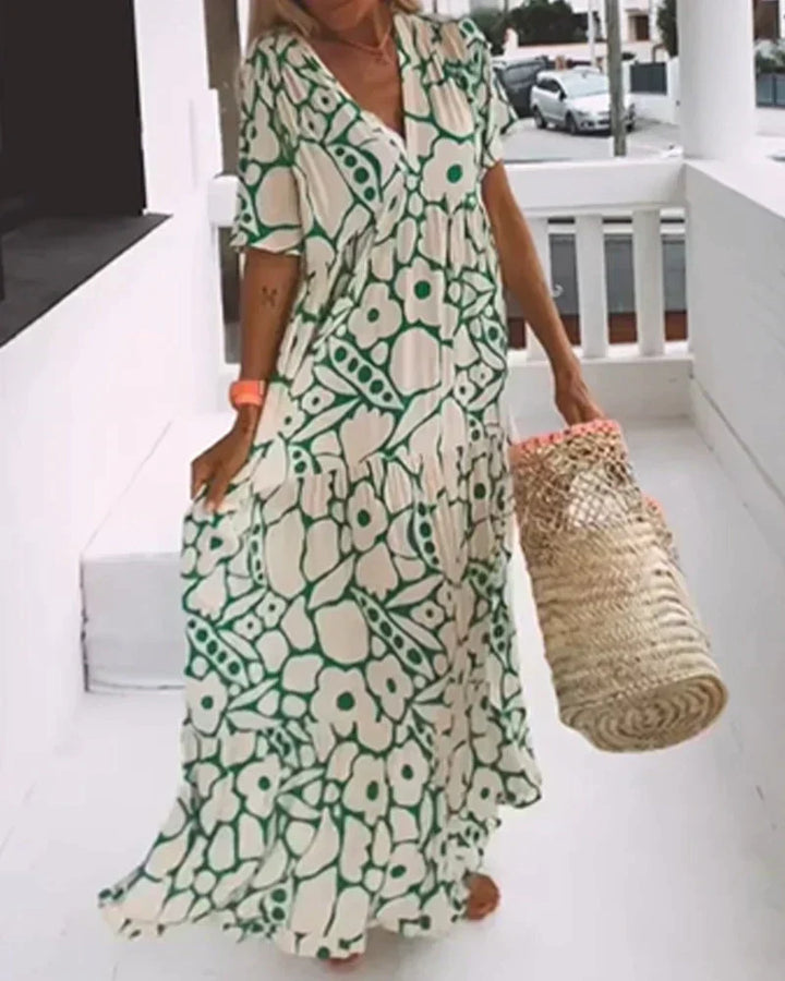 CHRISTINE | Élégante robe d’été longue à la silhouette fluide et au motif graphique tendance