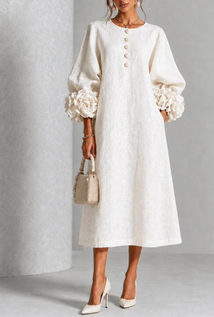 IVY | Robe midi fleurie romantique à élégantes manches avec poignets en forme de rose