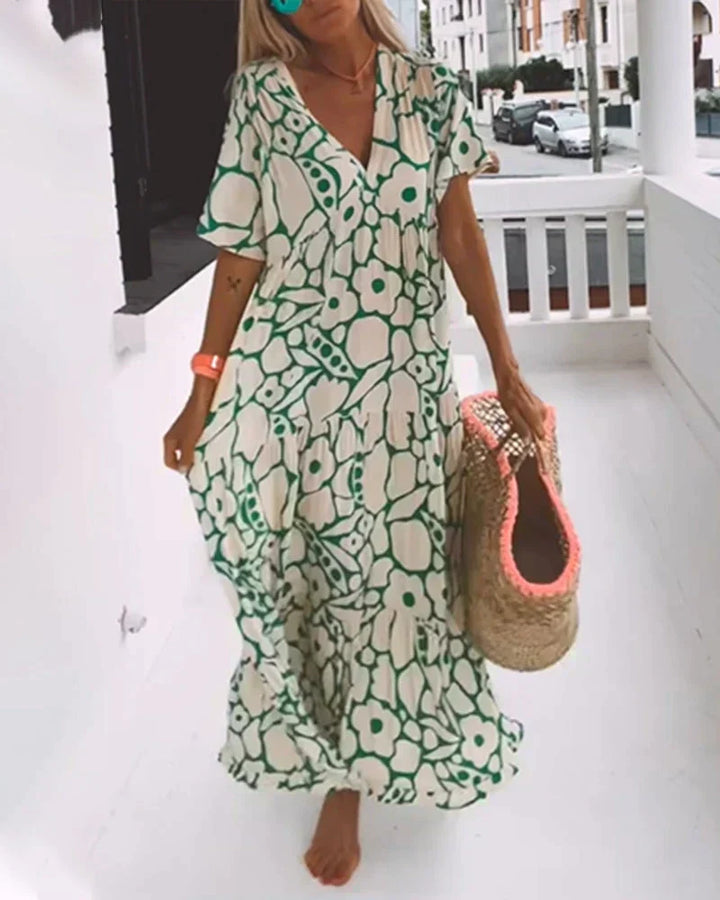 CHRISTINE | Élégante robe d’été longue à la silhouette fluide et au motif graphique tendance