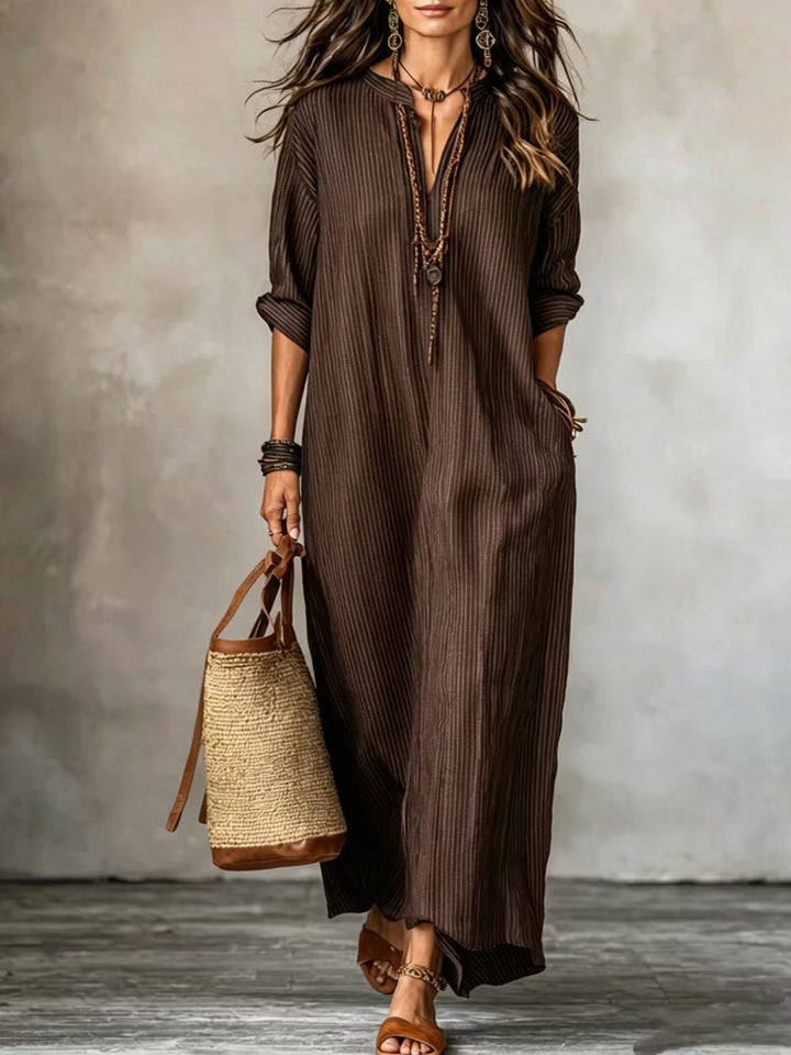 HAVEN | Robe longue élégante à rayures avec col en V, manches longues et poches latérales pratiques