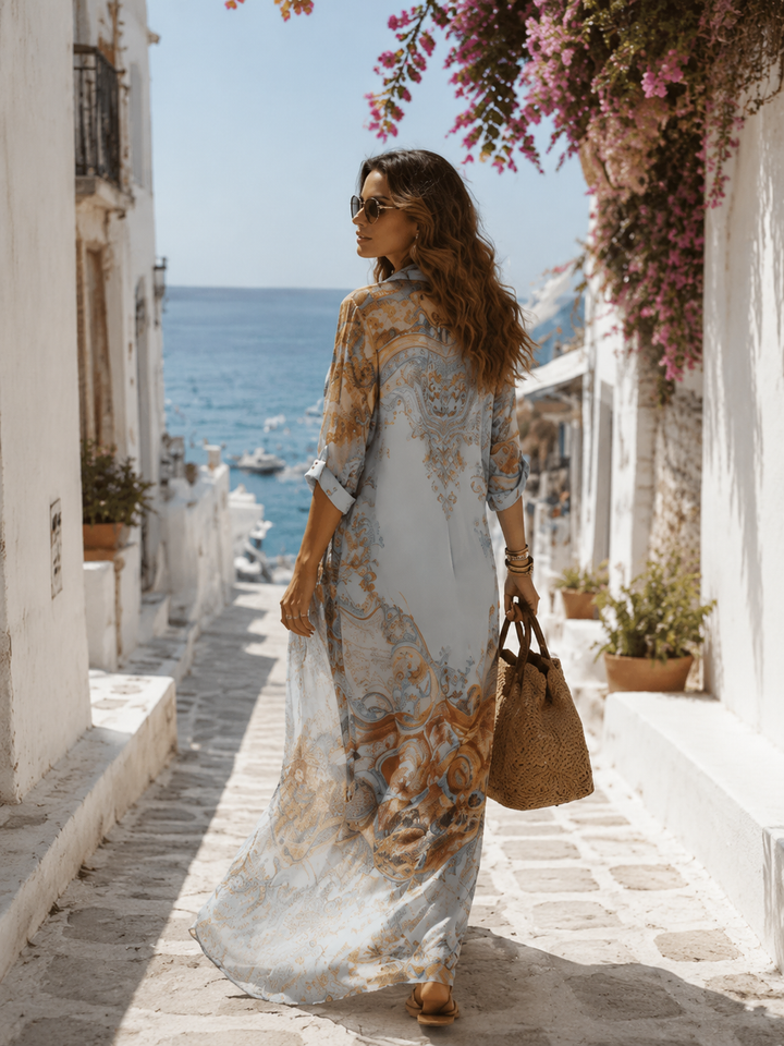 Robe longue en mousseline bleue à imprimé floral de style baroque