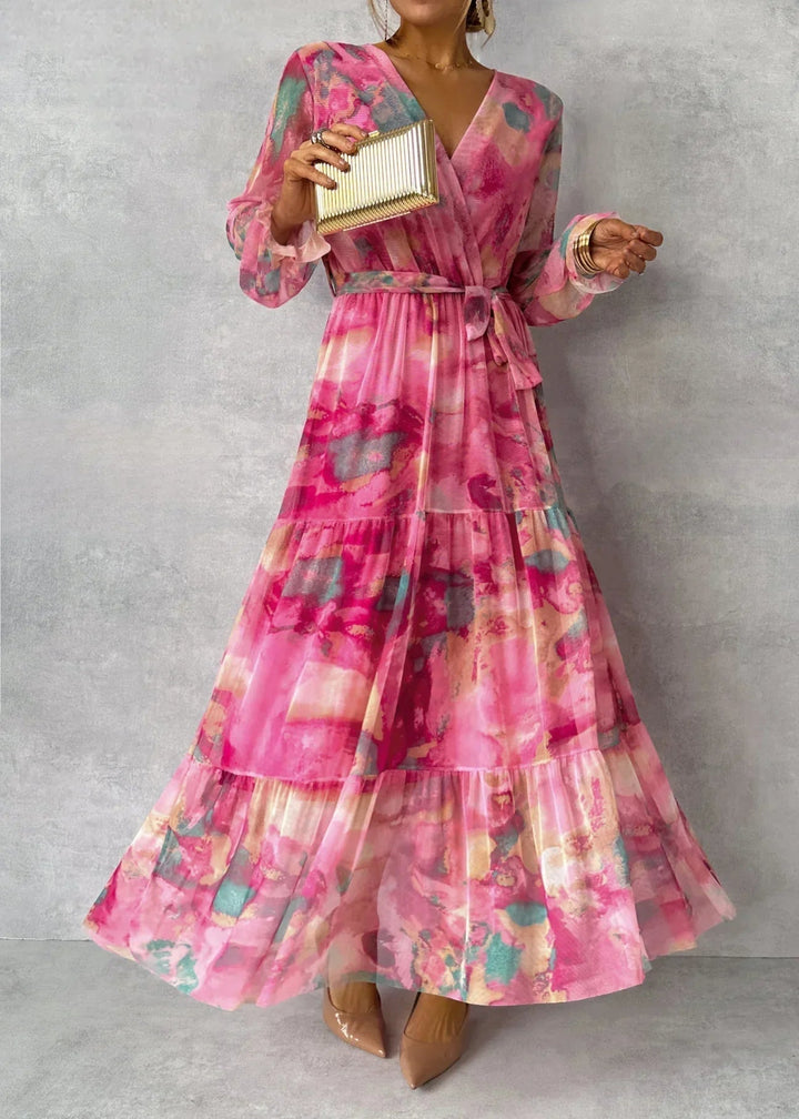 ZOEY | Robe portefeuille fleurie aux couleurs vives, avec une coupe flatteuse à volants superposés