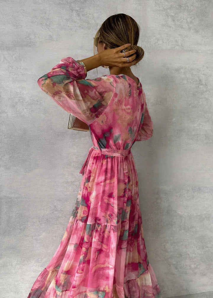 ZOEY | Robe portefeuille fleurie aux couleurs vives, avec une coupe flatteuse à volants superposés