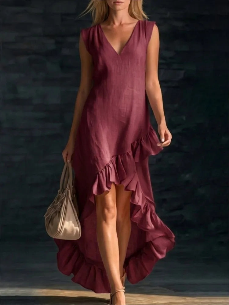 ROWAN | Élégante robe longue sans manches avec ourlet volanté romantique