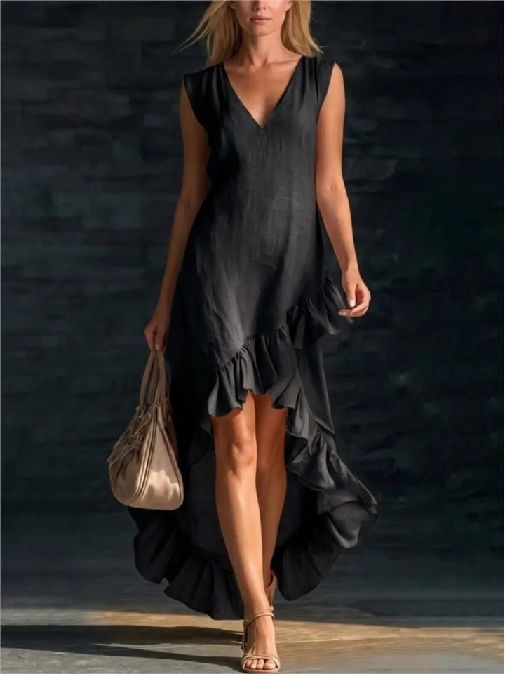 ROWAN | Élégante robe longue sans manches avec ourlet volanté romantique