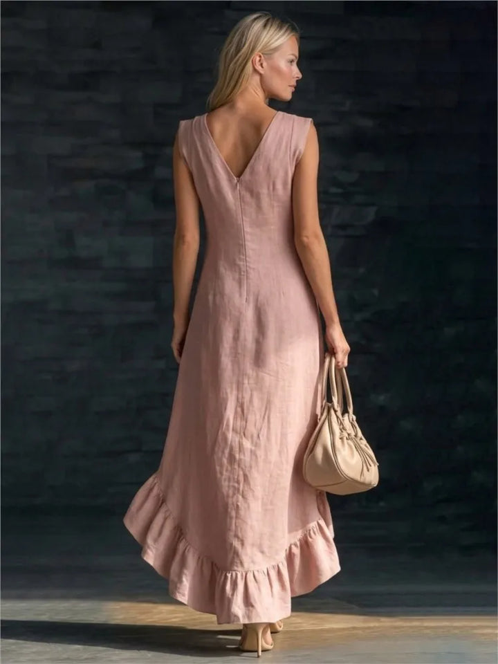 ROWAN | Élégante robe longue sans manches avec ourlet volanté romantique