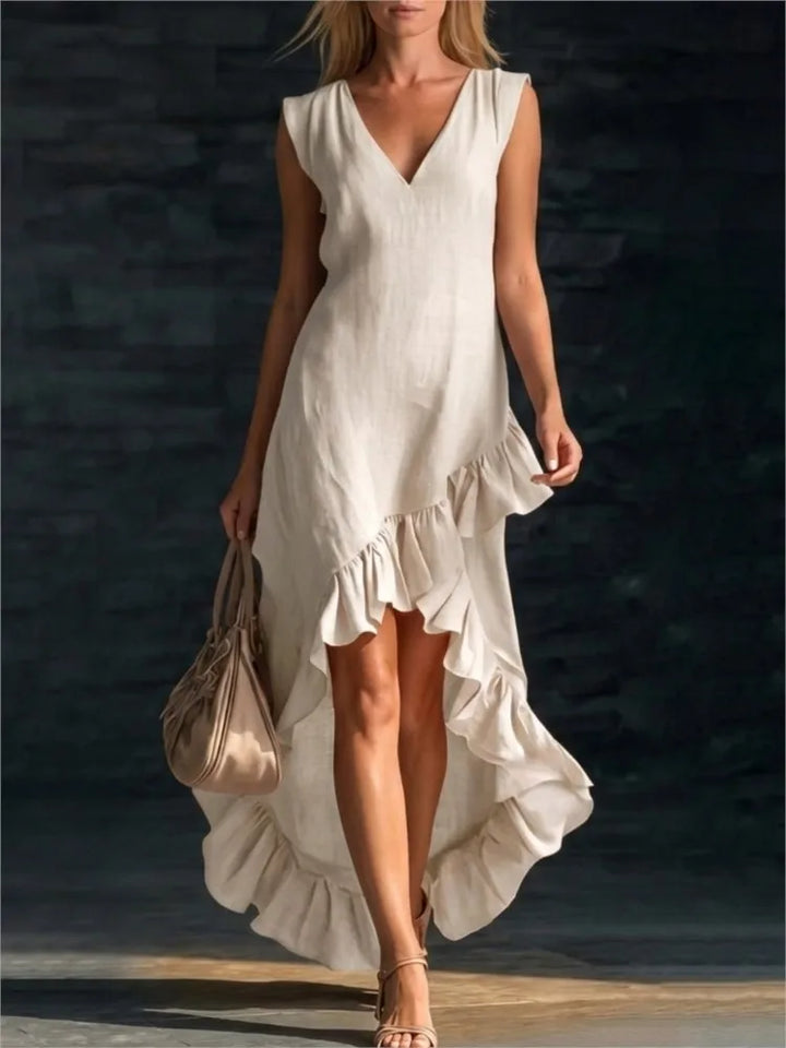 ROWAN | Élégante robe longue sans manches avec ourlet volanté romantique