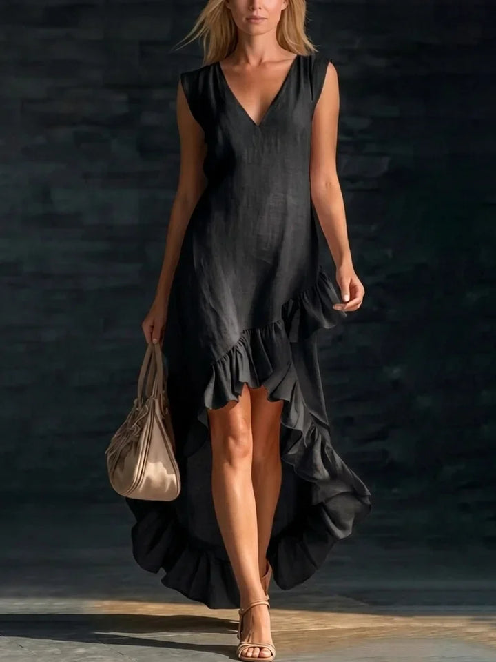 ROWAN | Élégante robe longue sans manches avec ourlet volanté romantique