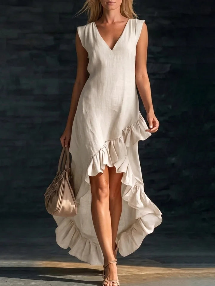 ROWAN | Élégante robe longue sans manches avec ourlet volanté romantique