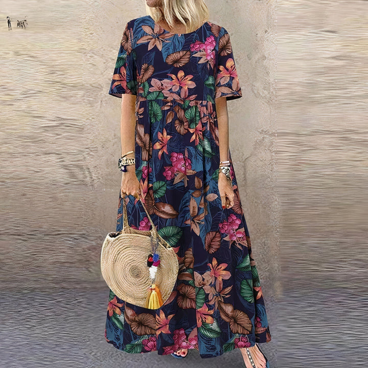 Lovi | Élégante robe midi fleurie à manches volantées