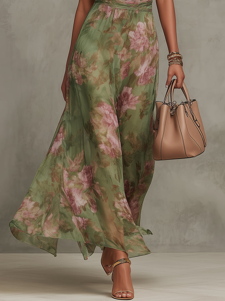 Serena — Élégante robe longue en mousseline à fleurs et col dos-nu