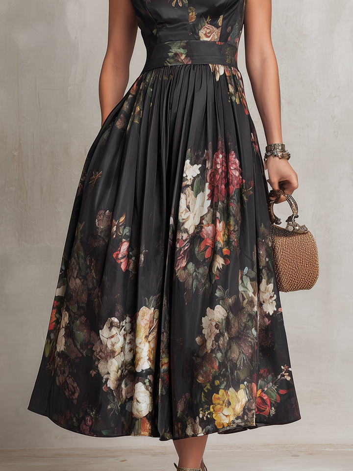 Violetta - Robe midi noire en satin plissé à motif floral et encolure ajourée