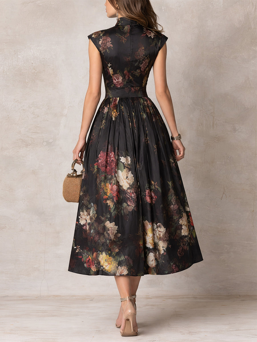 Violetta - Robe midi noire en satin plissé à motif floral et encolure ajourée