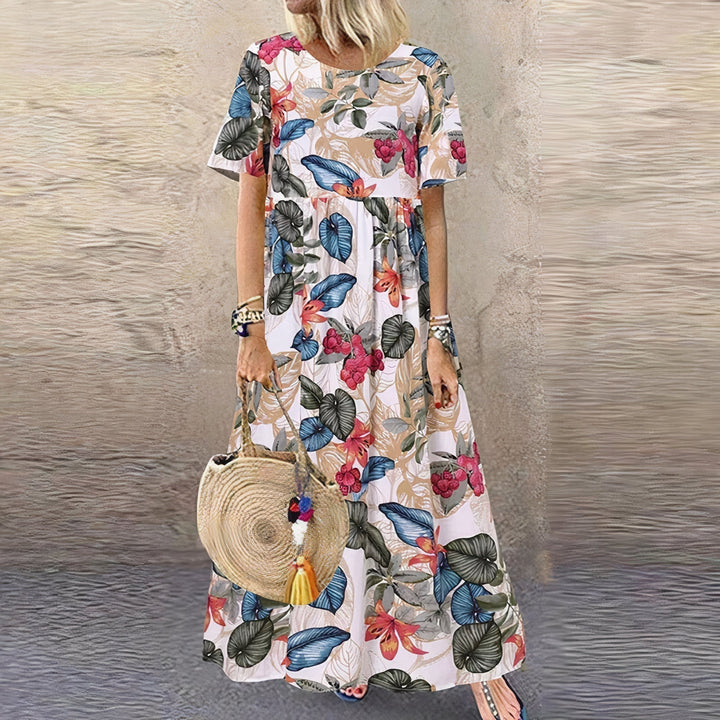 Lovi | Élégante robe midi fleurie à manches volantées