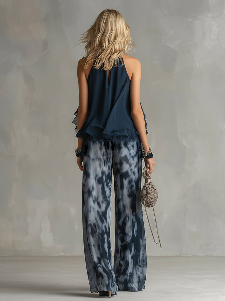 Ludovica | Ensemble élégant avec top dos-nu bleu marine et pantalon large imprimé