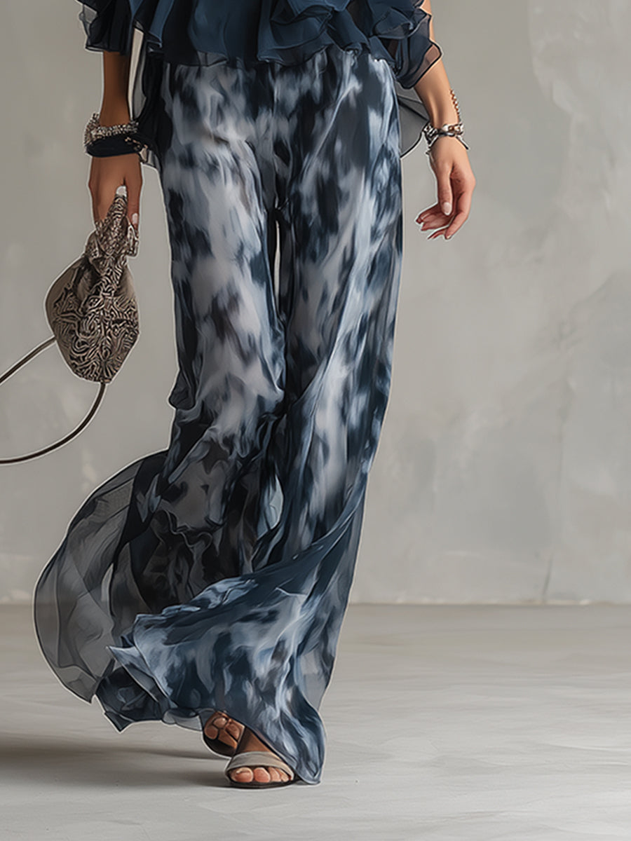 Ludovica | Ensemble élégant avec top dos-nu bleu marine et pantalon large imprimé