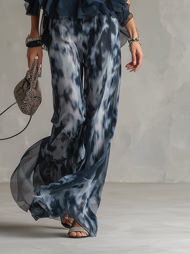 Ludovica | Ensemble élégant avec top dos-nu bleu marine et pantalon large imprimé