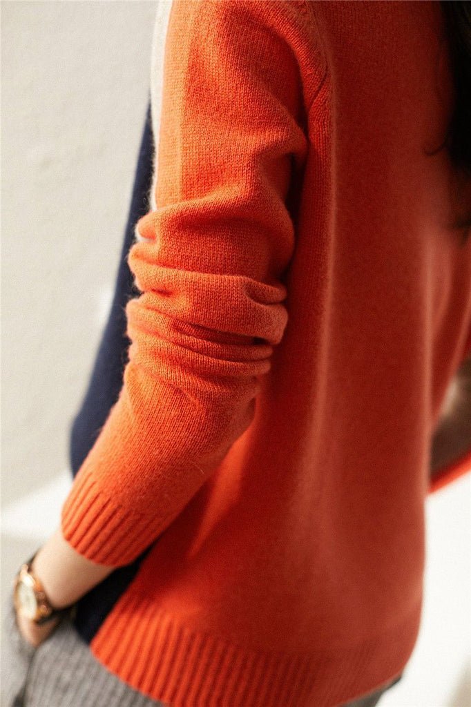 Vera | Pull rayé rétro bleu marine et orange