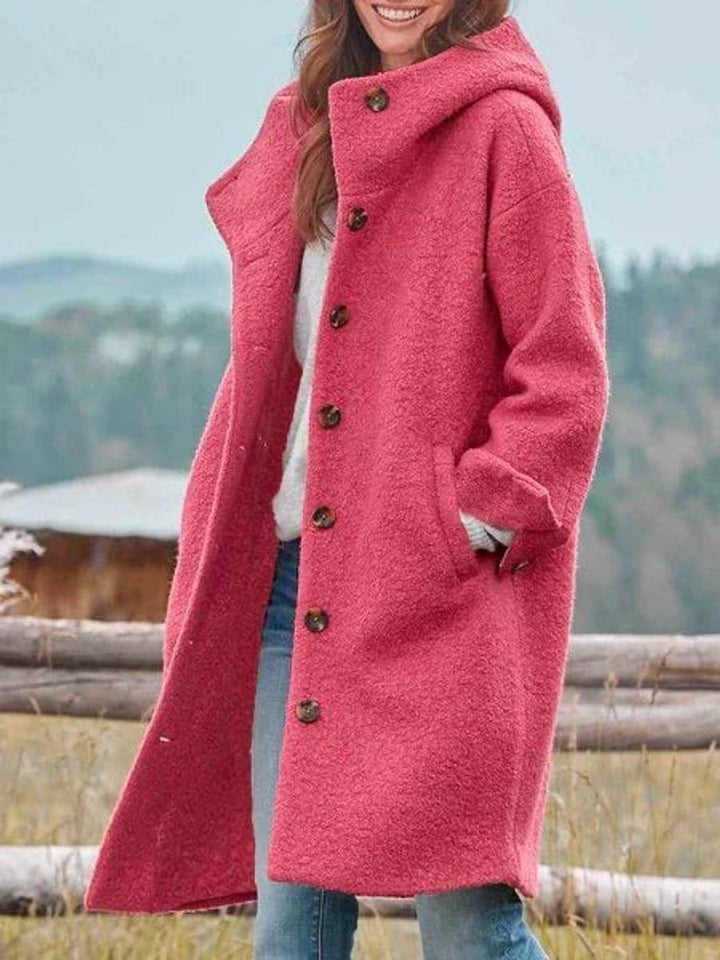Eleanor | Manteau long à capuche boutonné sur le devant, au style intemporel