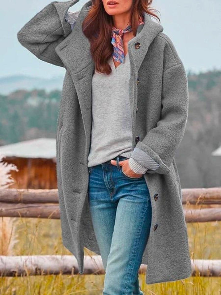 Eleanor | Manteau long à capuche boutonné sur le devant, au style intemporel